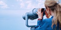 girl-sea-binoculars-vacation-160514